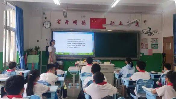 三实验推普周 普通话诵百年伟业,规范字写时代新篇 青岛市第三实验初中举行推普周活动